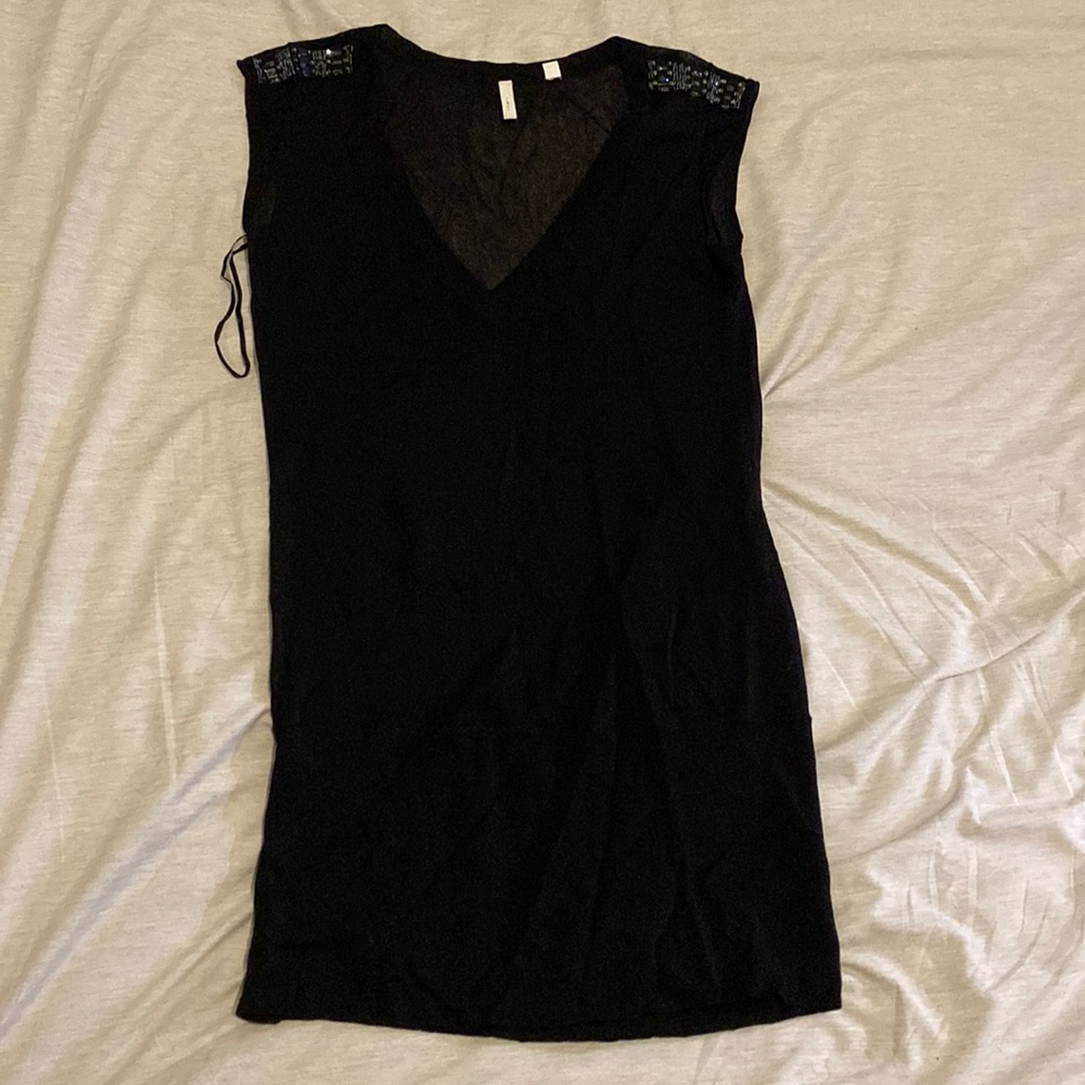 Sheer black tank top with bedazzled top